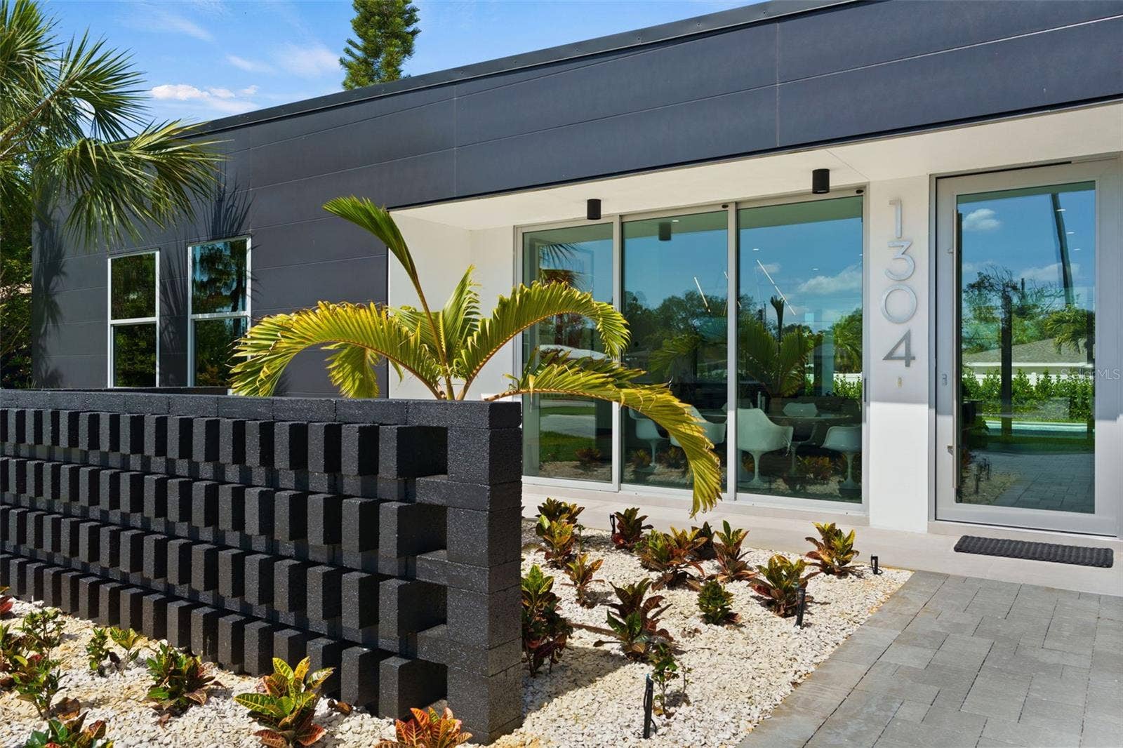 1304 INDIAN ROCKS ROAD, Belleair, FL 33756 Breeze Block Patio Creates Unique Entry