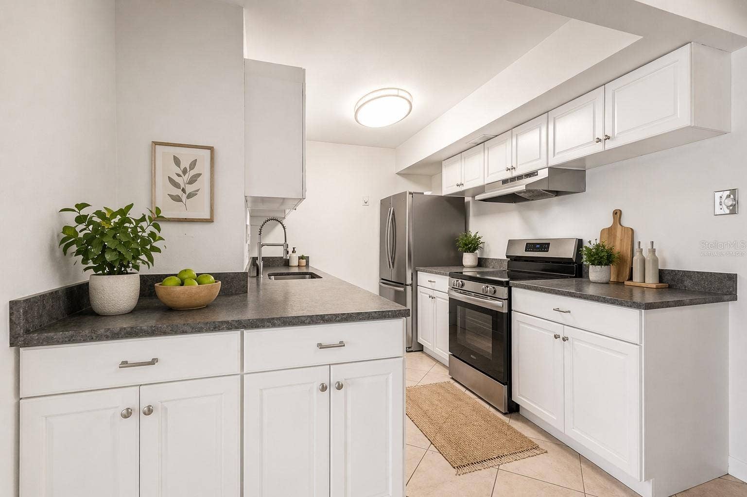 10355 PARADISE BOULEVARD, #403, Treasure Island, FL 33706 Virtually Staged Kitchen