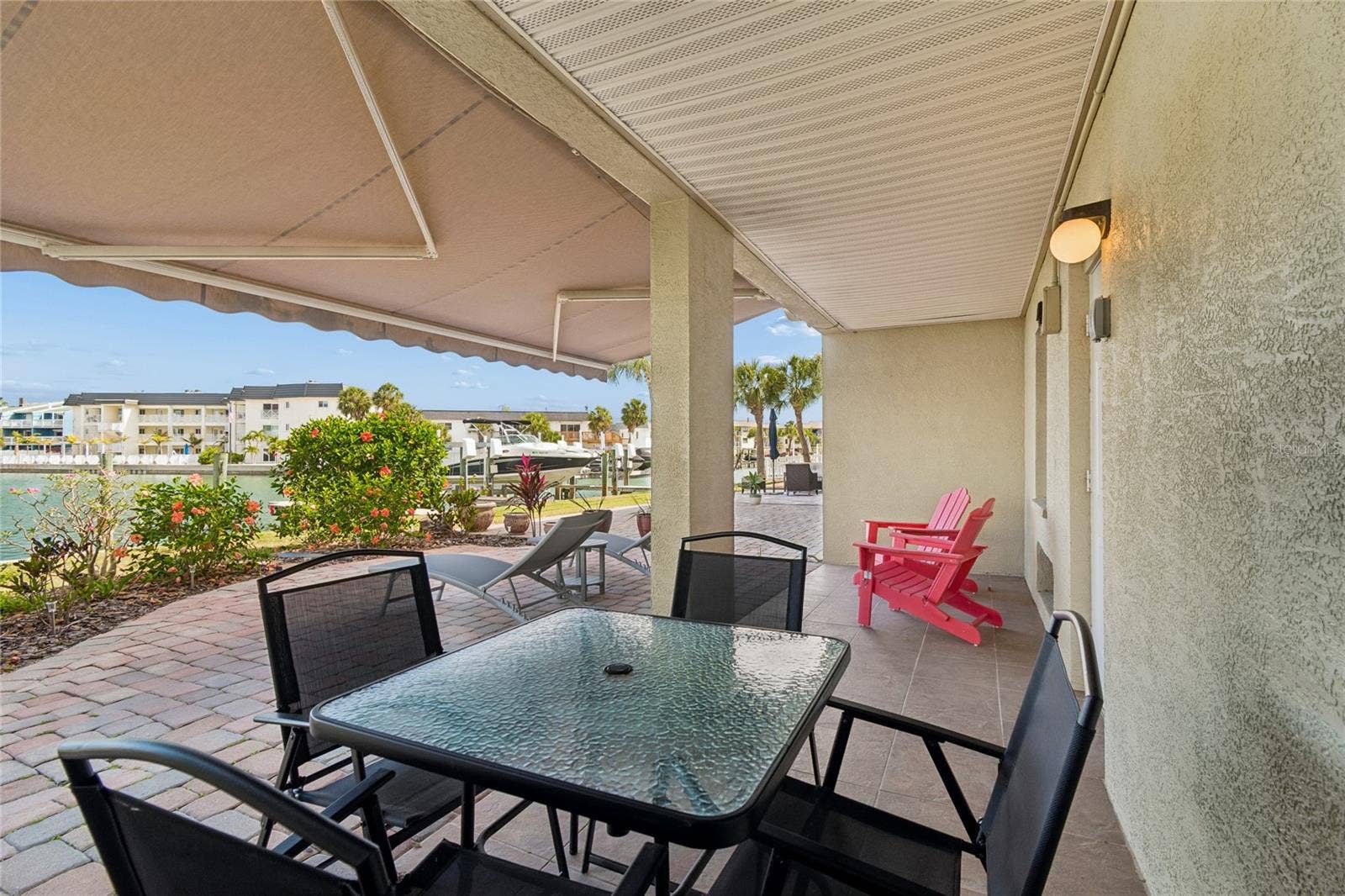 152 117TH AVENUE, Treasure Island, FL 33706 Ground level waterfront patio, perfect for grilling and relaxing by the water