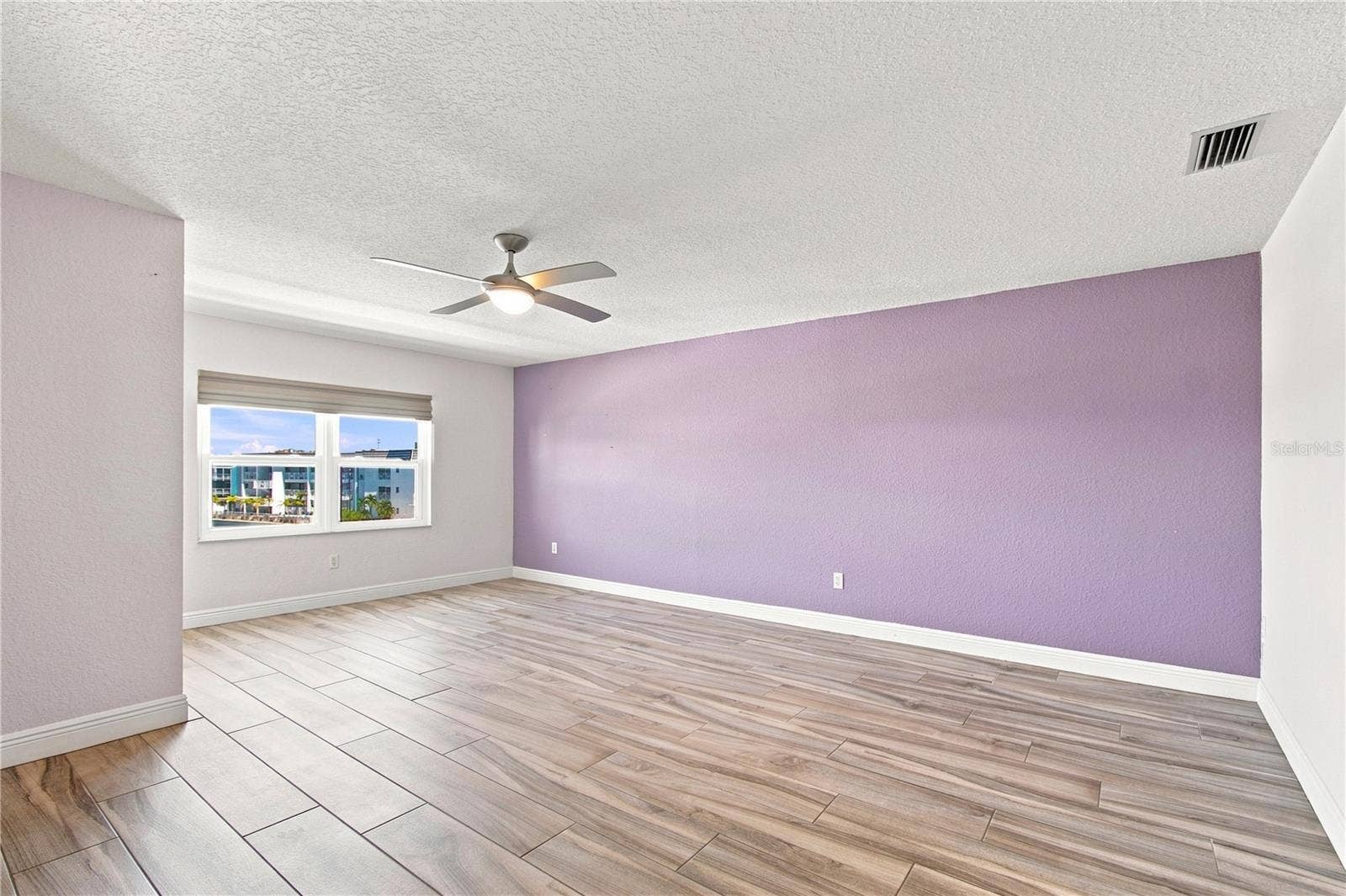 152 117TH AVENUE, Treasure Island, FL 33706 This primary bedroom is so large you can fit all your furniture