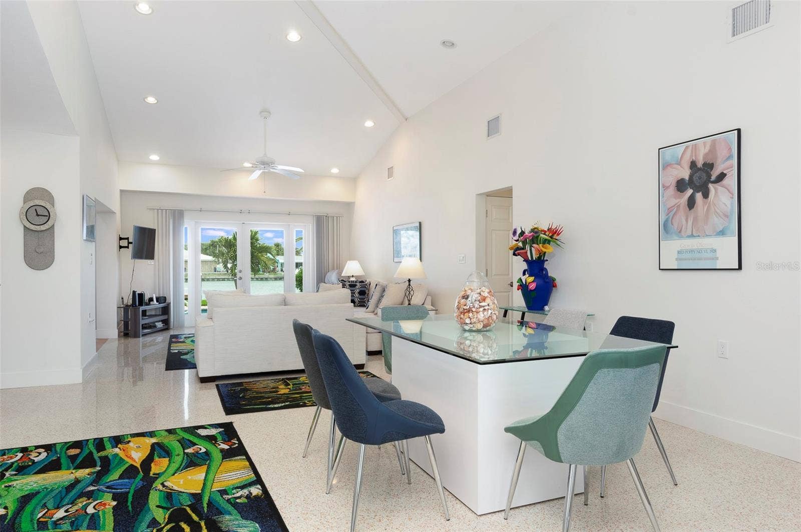 Airy vaulted ceilings throughout create an inviting atmosphere