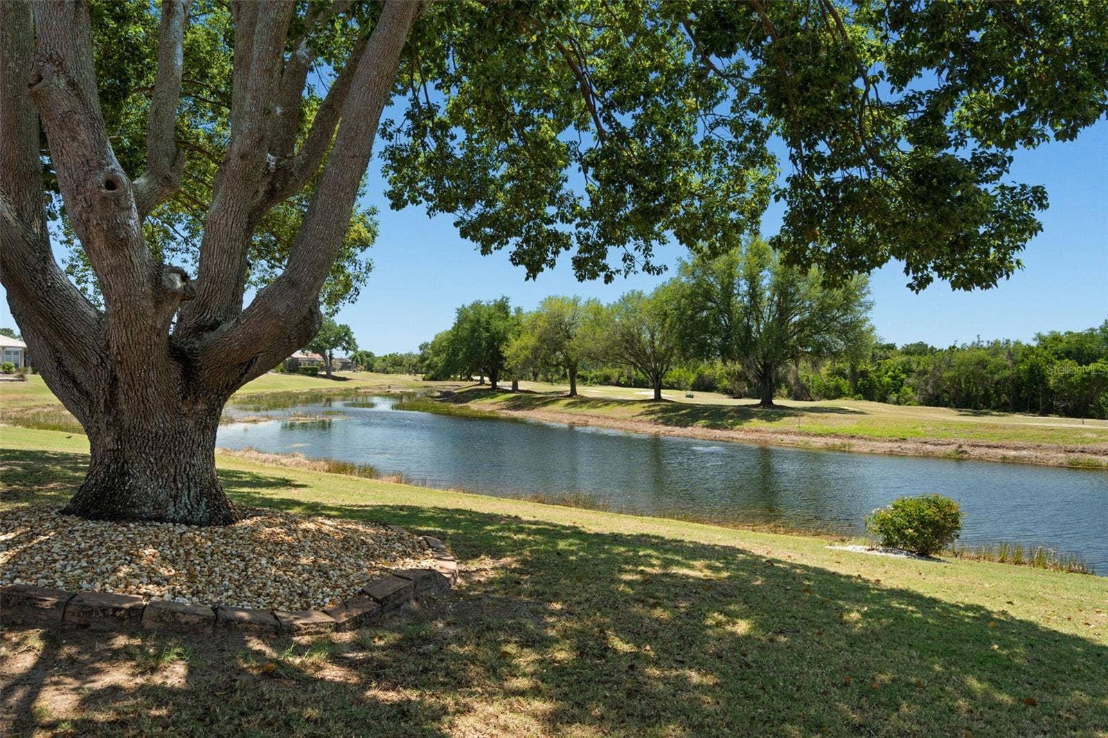 1134 SIGNATURE DRIVE, Sun City Center, FL 33573 Golf Course and Water Views