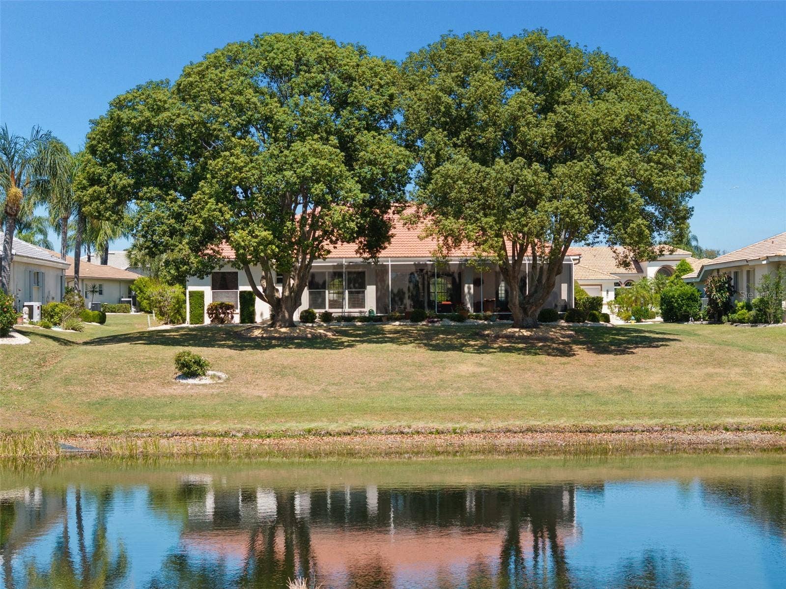1134 SIGNATURE DRIVE, Sun City Center, FL 33573 Sunning Water and Golf Views
