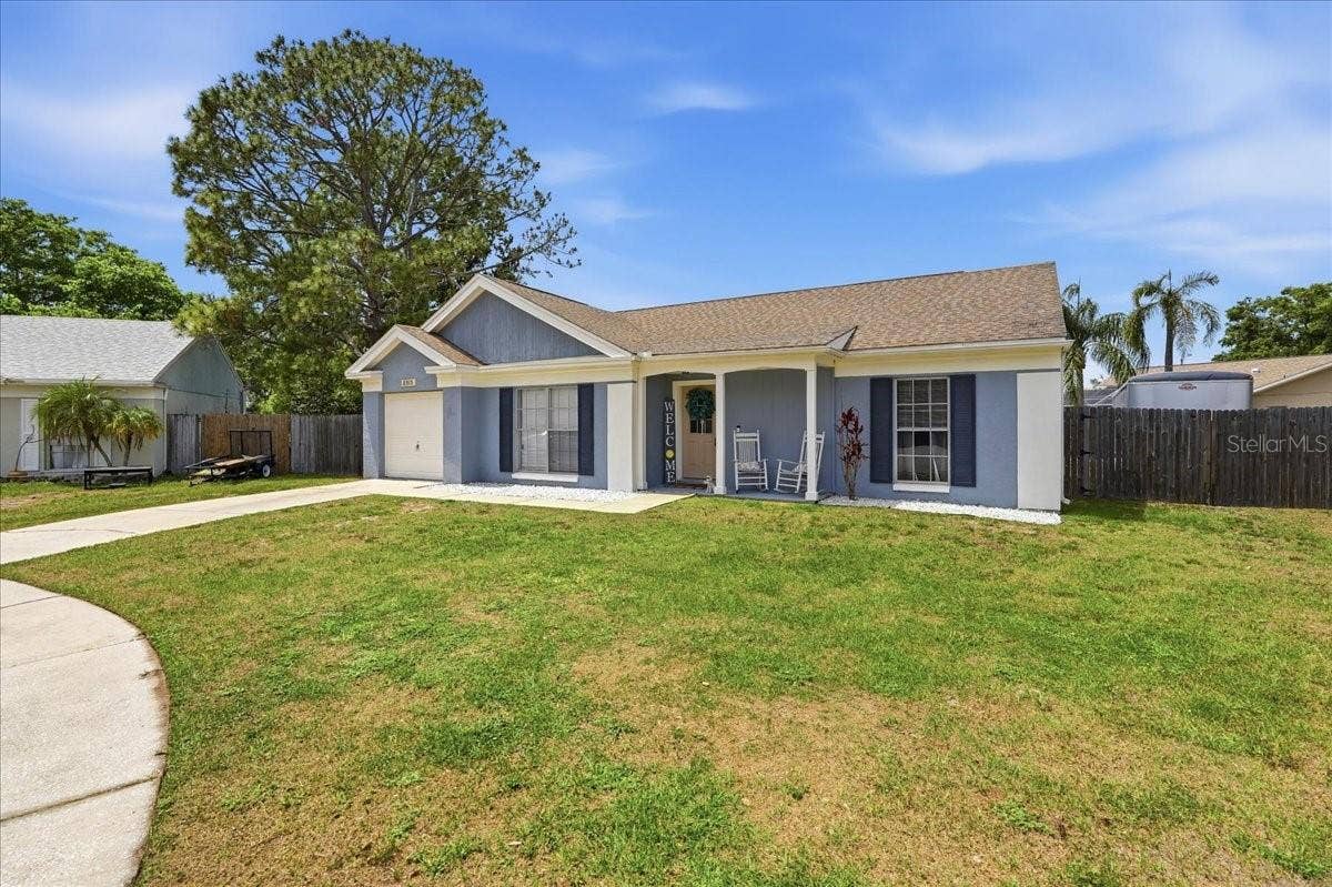 8913 WOOD LAKE COURT, New Port Richey, FL 34653 OVER A QUARTER OF AN ACRE!