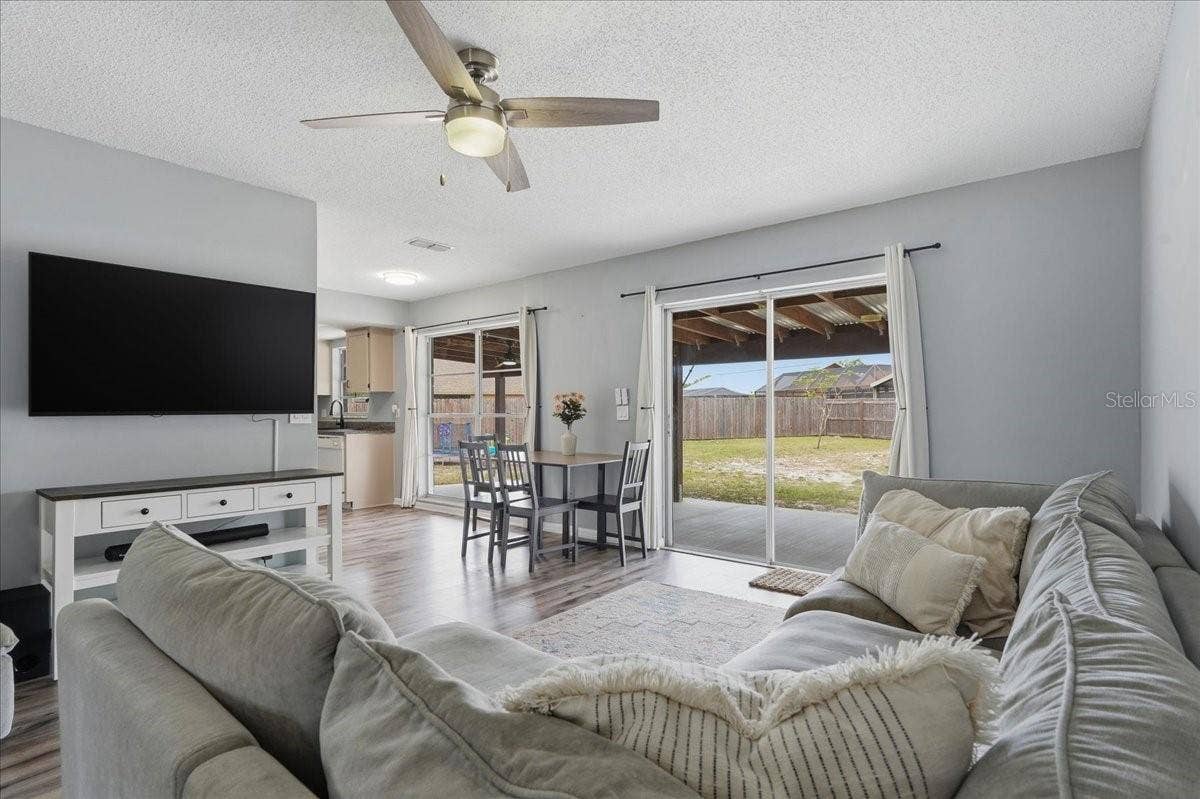 8913 WOOD LAKE COURT, New Port Richey, FL 34653 LUXURY VINYL WOOD PLANK FLOORING IN THE MAIN LIVING AREAS