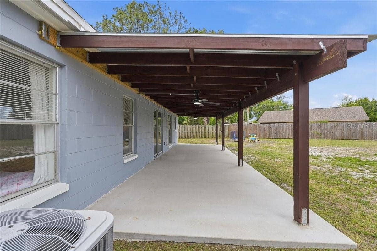 8913 WOOD LAKE COURT, New Port Richey, FL 34653 IMAGINE THE ENTERTAINING/FAMILY TIME OUT HERE!