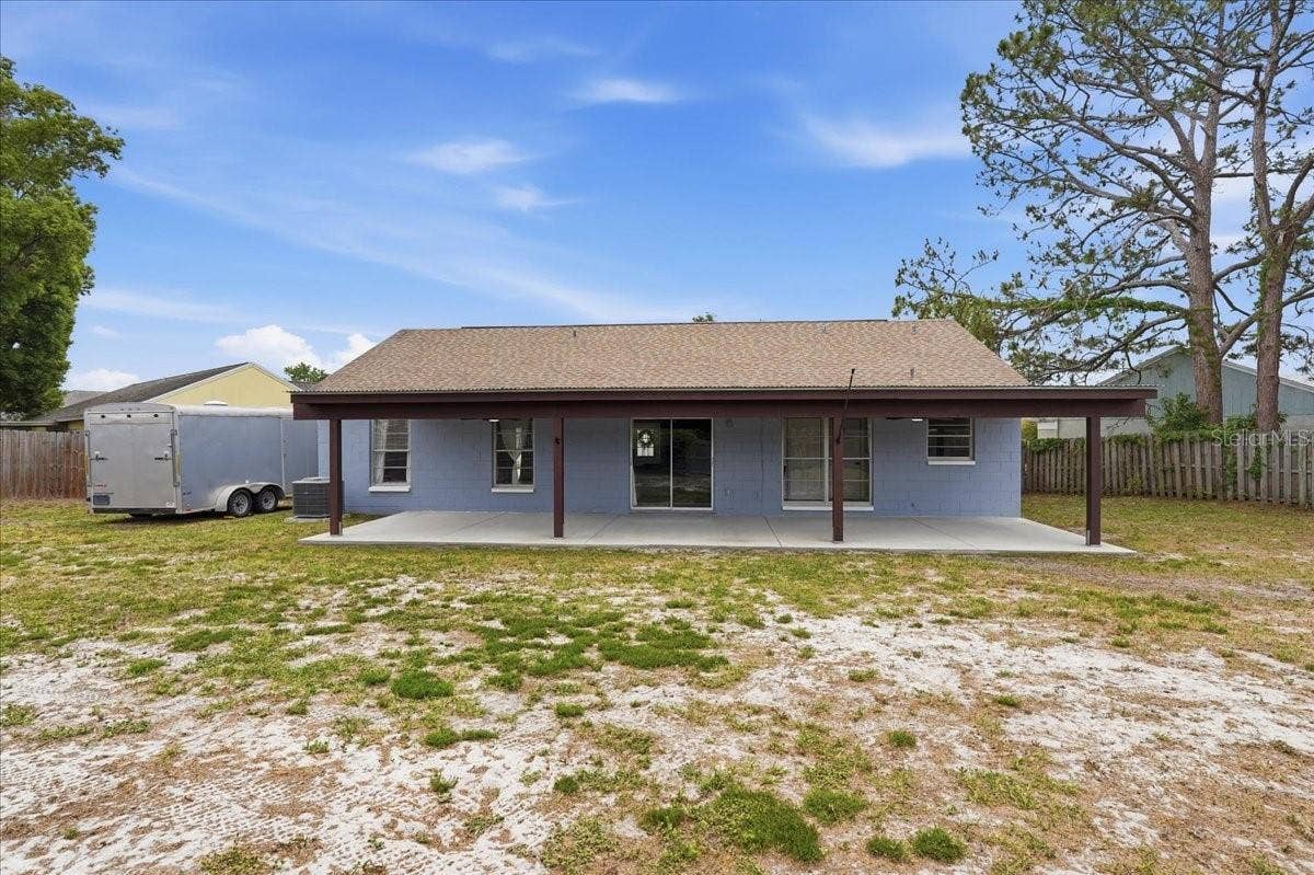 8913 WOOD LAKE COURT, New Port Richey, FL 34653 NO HOA! PARK YOUR BOAT, TRAILER OR RV IN YOUR BACKYARD!
