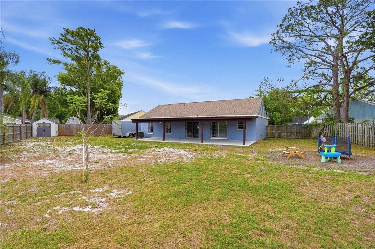 8913 WOOD LAKE COURT, New Port Richey, FL 34653 OVER A QUARTER OF AN ACRE ~ ALL YOURS!