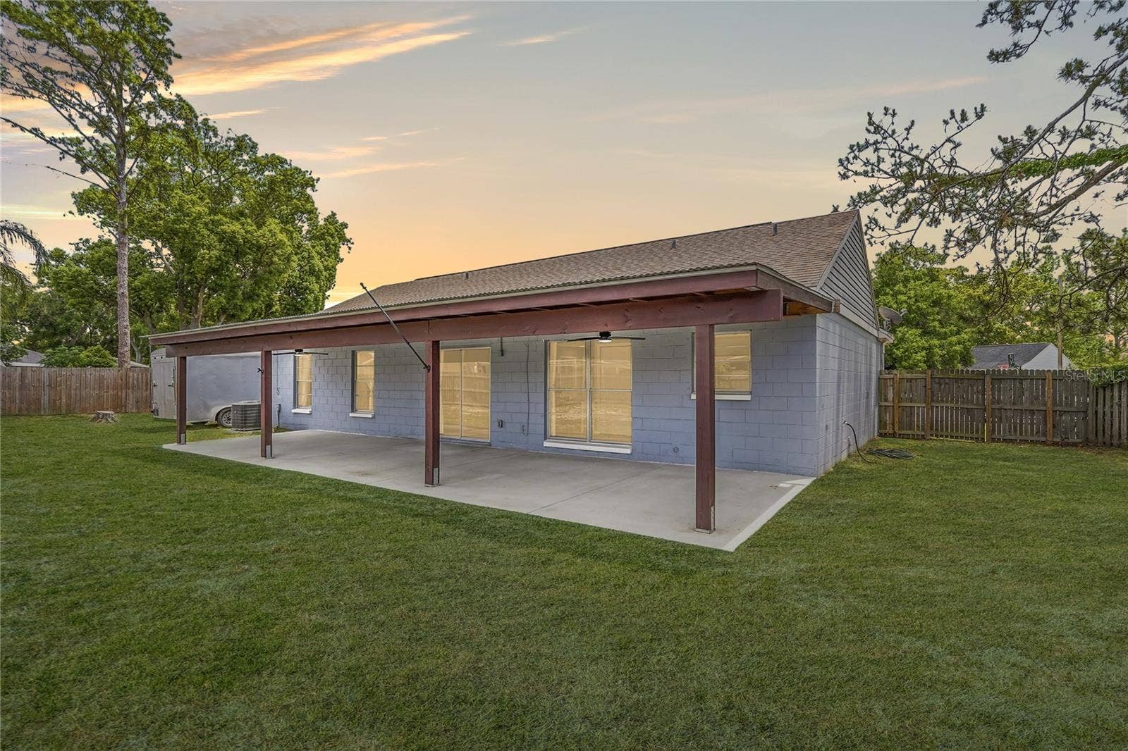 8913 WOOD LAKE COURT, New Port Richey, FL 34653 COVERED, EXPANSIVE REAR PATIO!