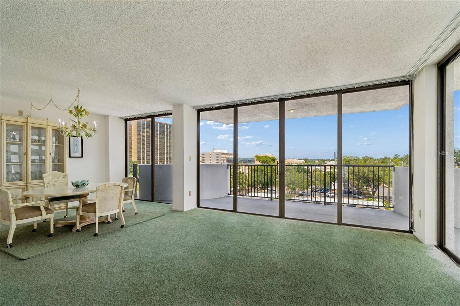 Floor to Ceiling Sliders and Balcony!