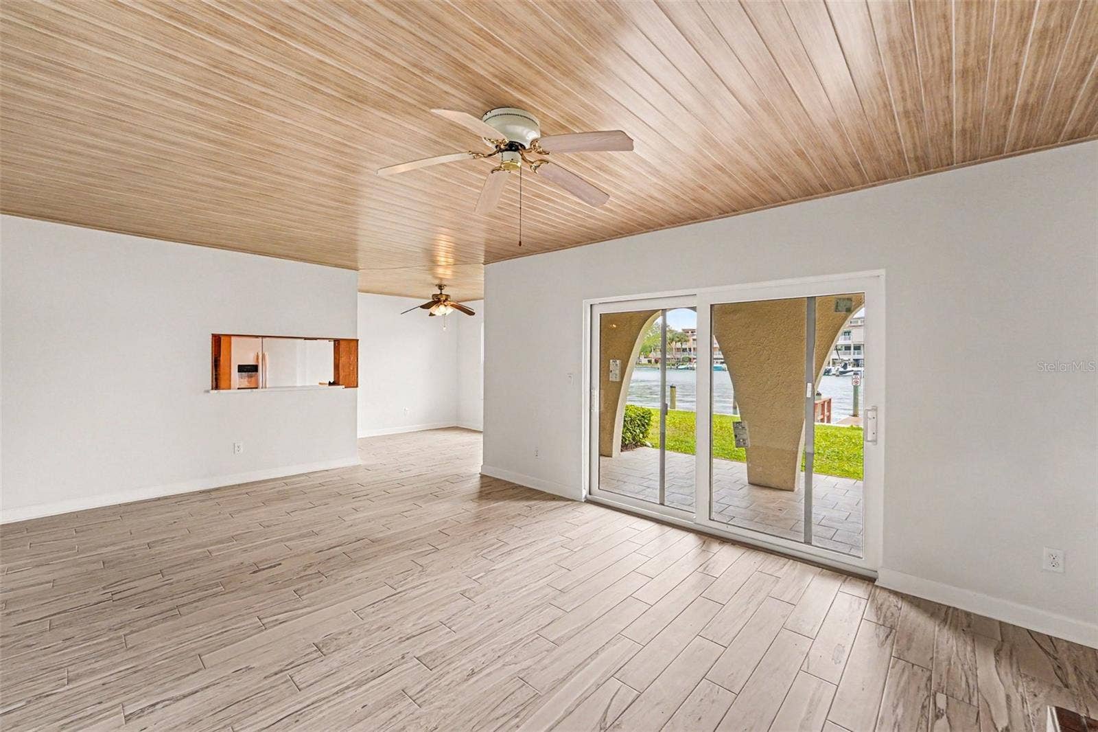 546 PLAZA SEVILLE COURT, #85, Treasure Island, FL 33706 Living Room Water View