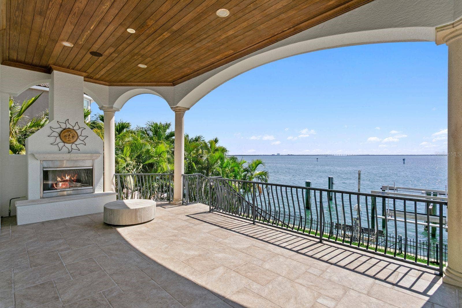 This gorgeous balcony off the family room, with an outdoor fireplace provides the perfect setting for morning coffee or evening cocktails.