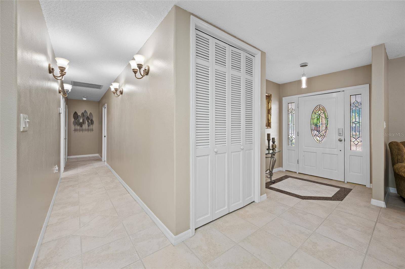 Hallway to Primary Bedroom & Bedroom 2