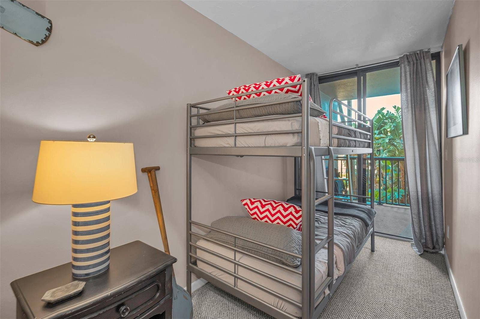 1660 GULF BOULEVARD, #208, Clearwater Beach, FL 33767 Second bedroom bunkbed with the balcony adjacent