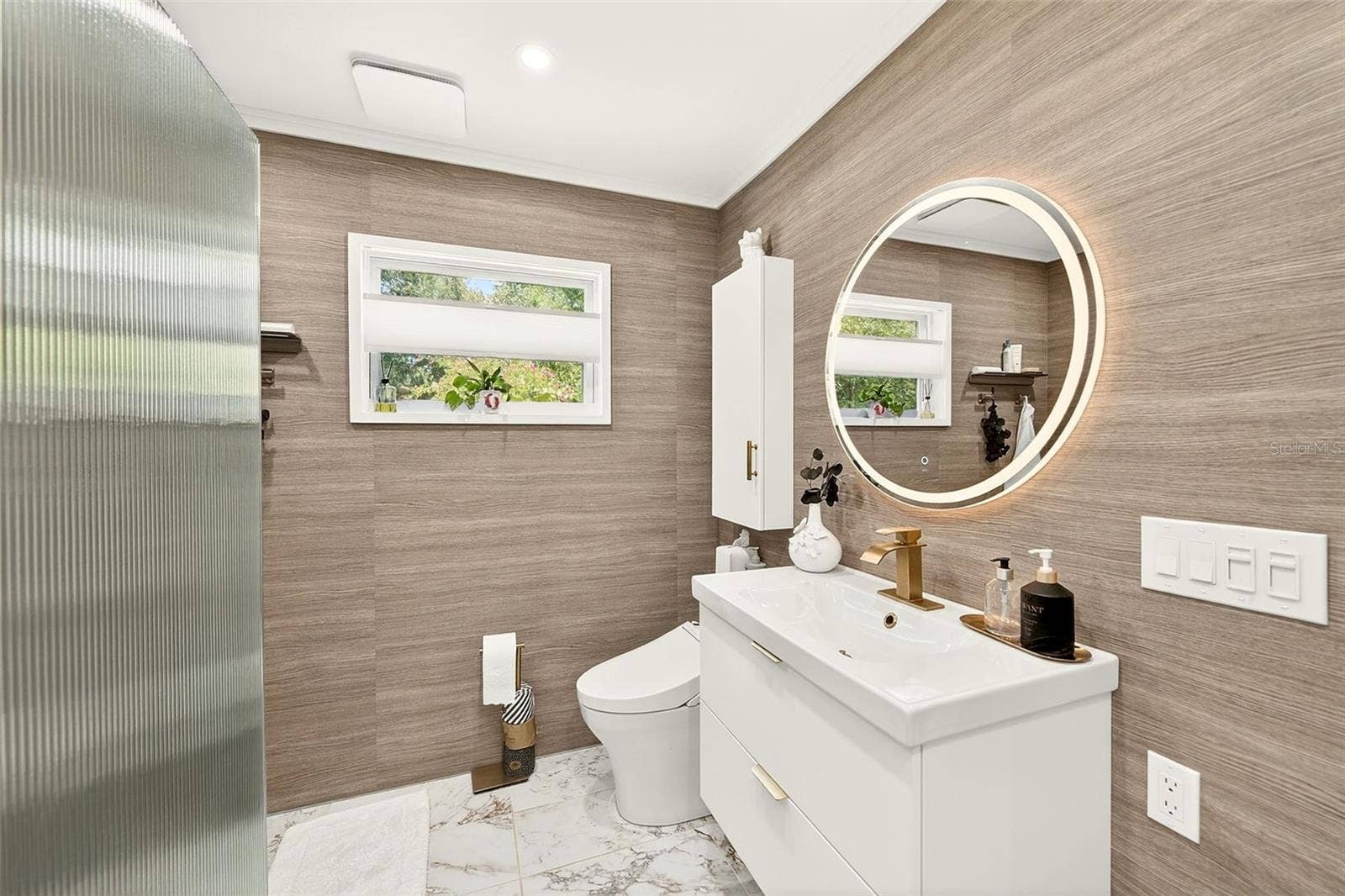 175 RIVIERE ROAD, Palm Harbor, FL 34683 Primary in suite bathroom with Toto Bidet and a vanity that stores everything!