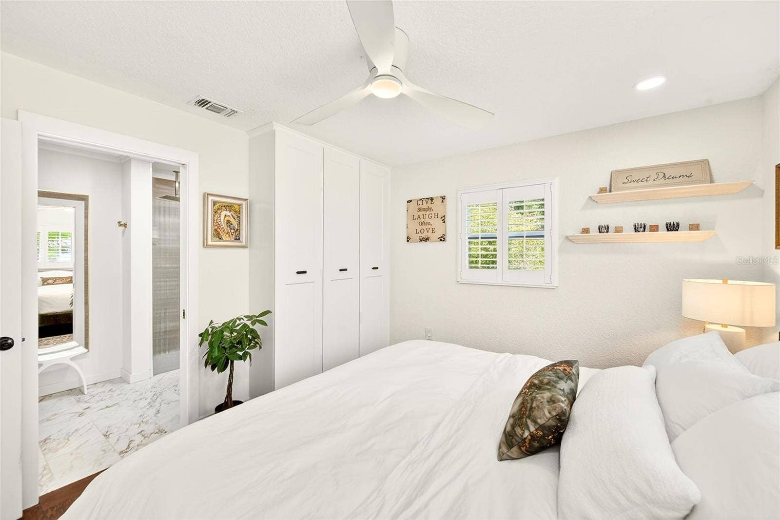 175 RIVIERE ROAD, Palm Harbor, FL 34683 Primary bedroom with built in closet