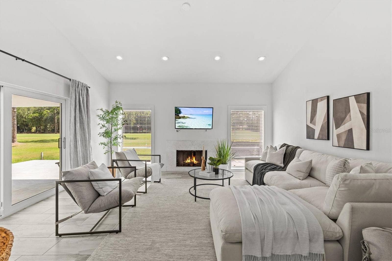 13915 WHISPERWOOD DRIVE, Clearwater, FL 33762 family room overlooking golf course