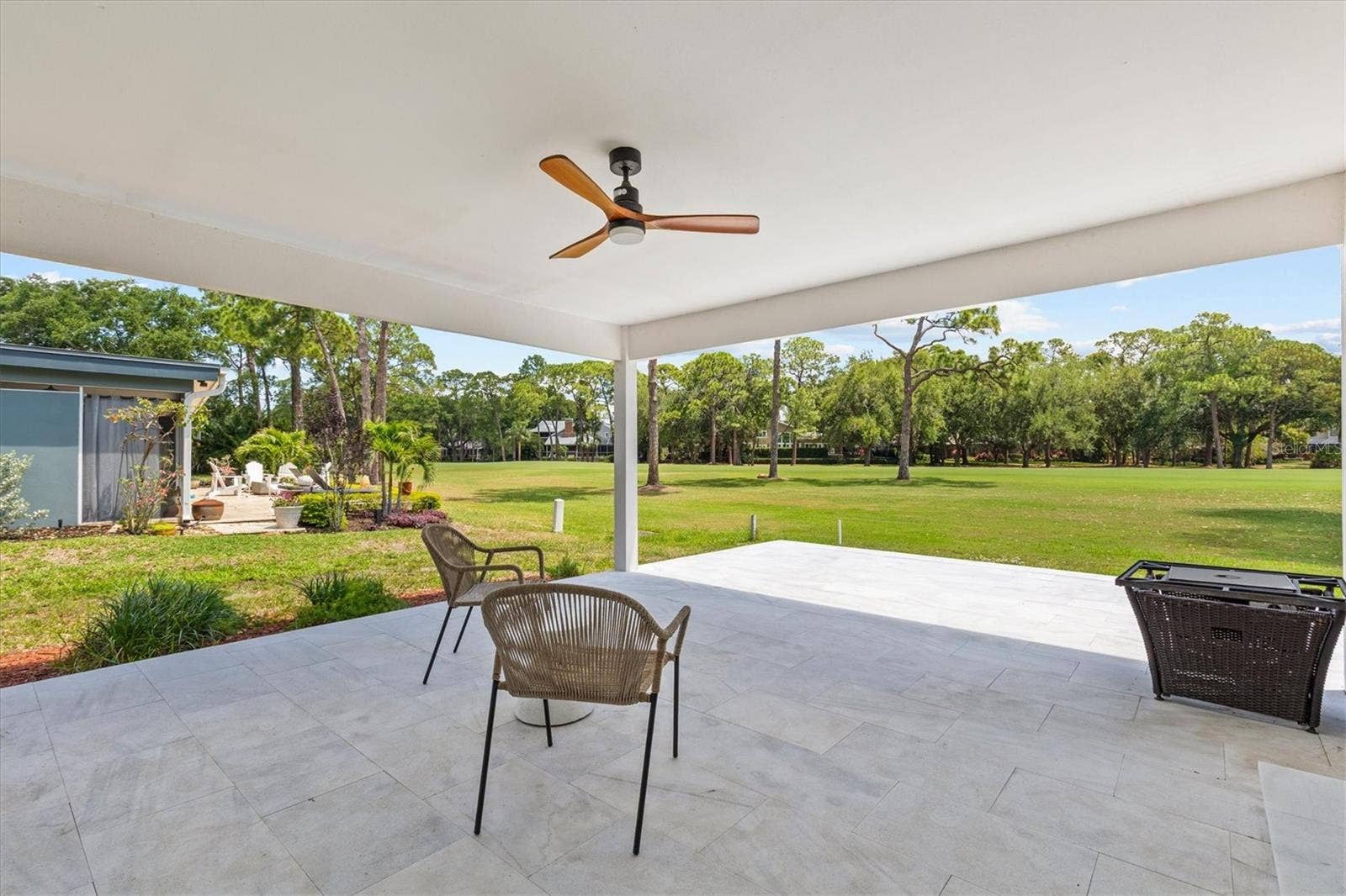 13915 WHISPERWOOD DRIVE, Clearwater, FL 33762 Outdoor lanai overlooking golf course