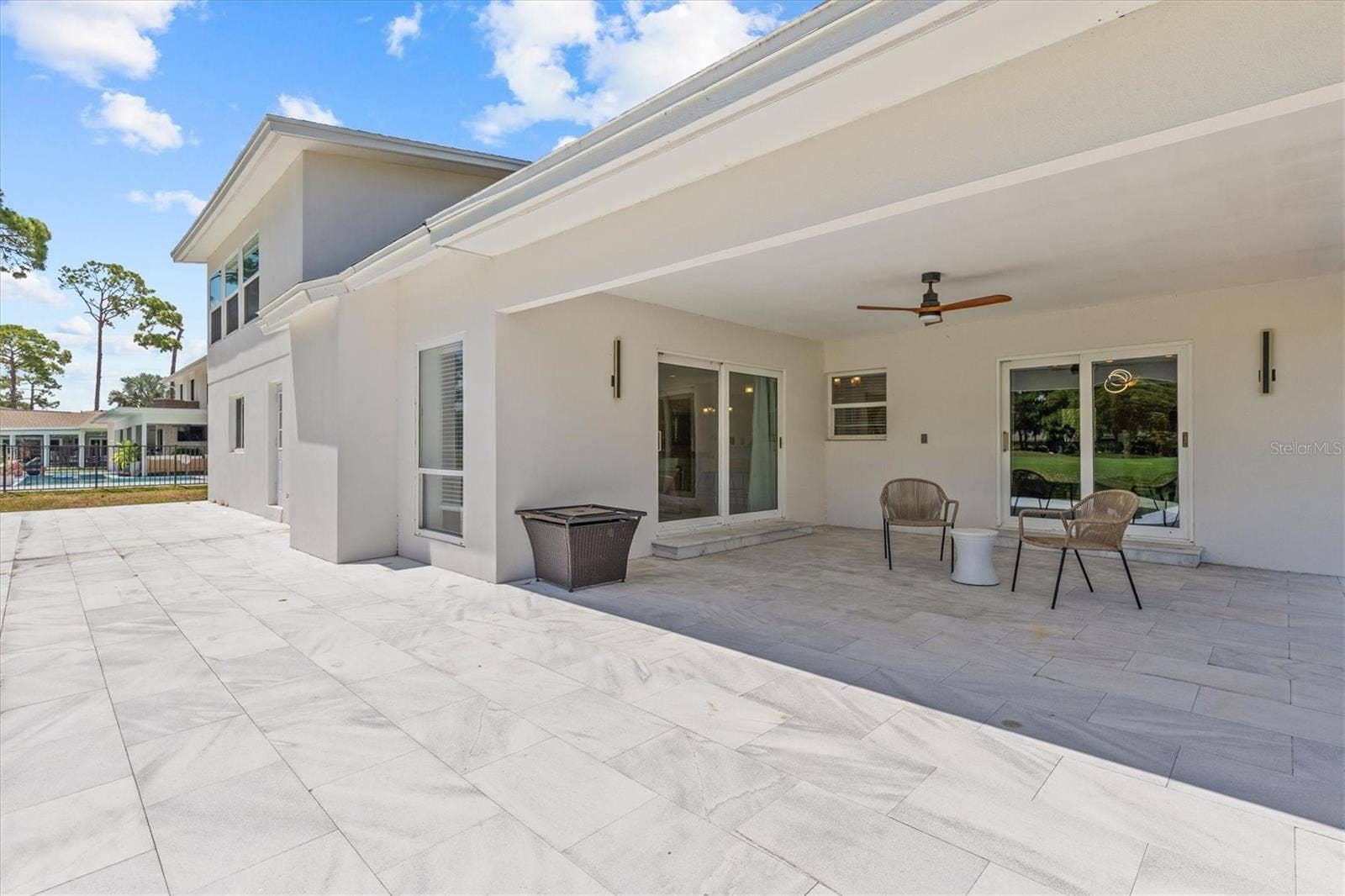 13915 WHISPERWOOD DRIVE, Clearwater, FL 33762 Outdoor lanai overlooking golf course