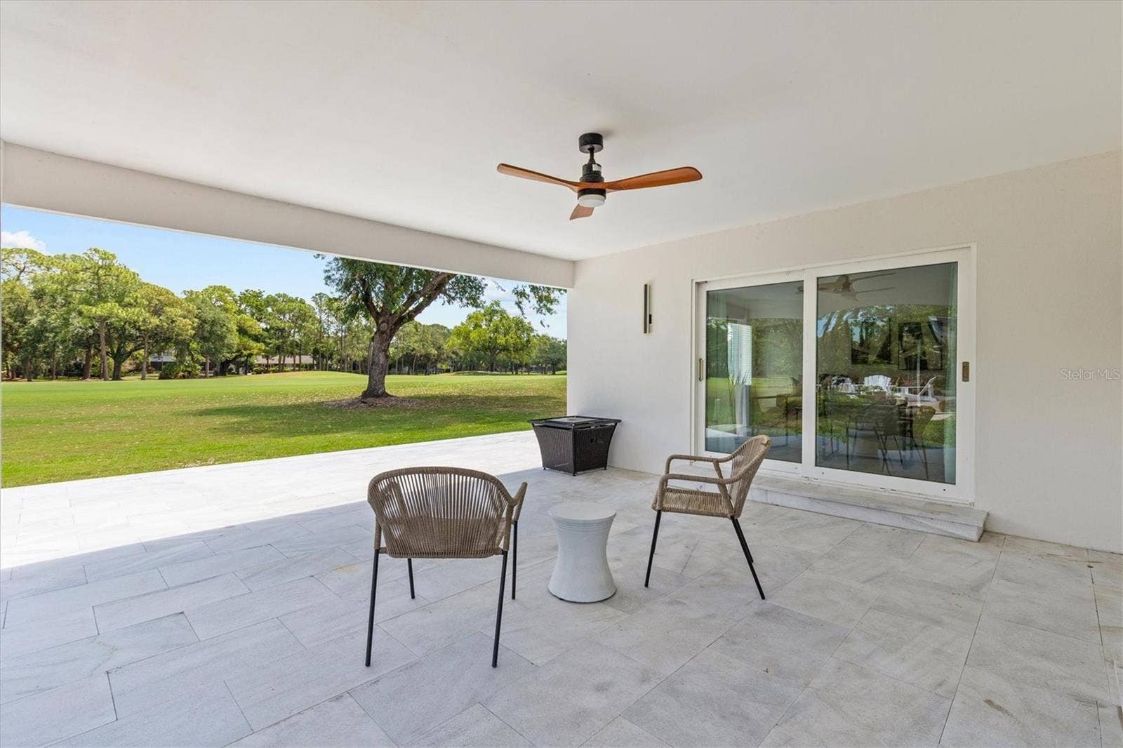 13915 WHISPERWOOD DRIVE, Clearwater, FL 33762 Outdoor lanai overlooking golf course
