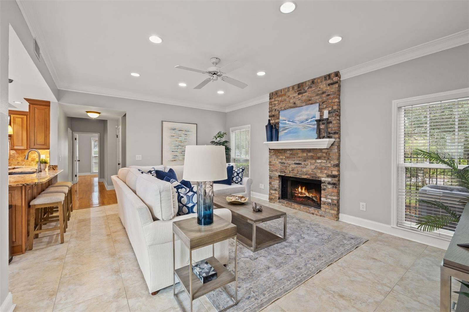 3233 W PARKLAND BOULEVARD, Tampa, FL 33609 Family room with wood burning fireplace