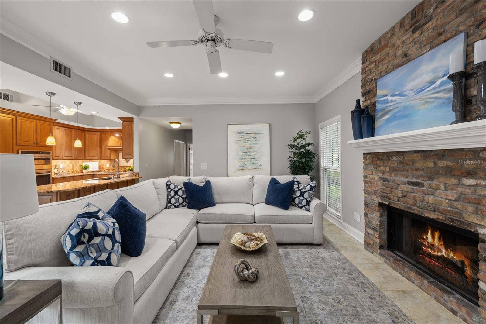 3233 W PARKLAND BOULEVARD, Tampa, FL 33609 Family room with wood burning fireplace