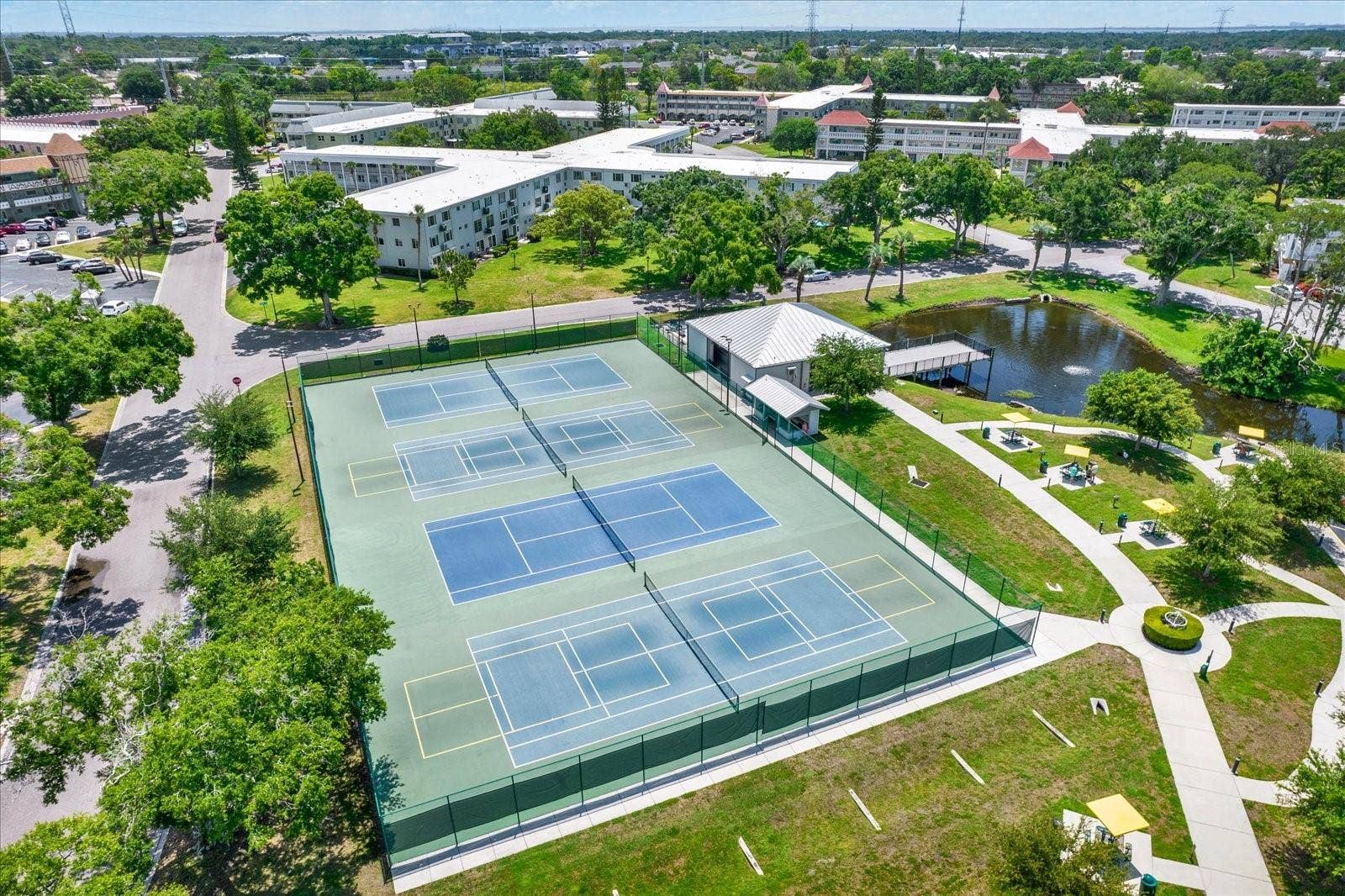 Aerial-View-Tennis-Pickleball-Courts-Pond-Community-Amenities-Clearwater-FL