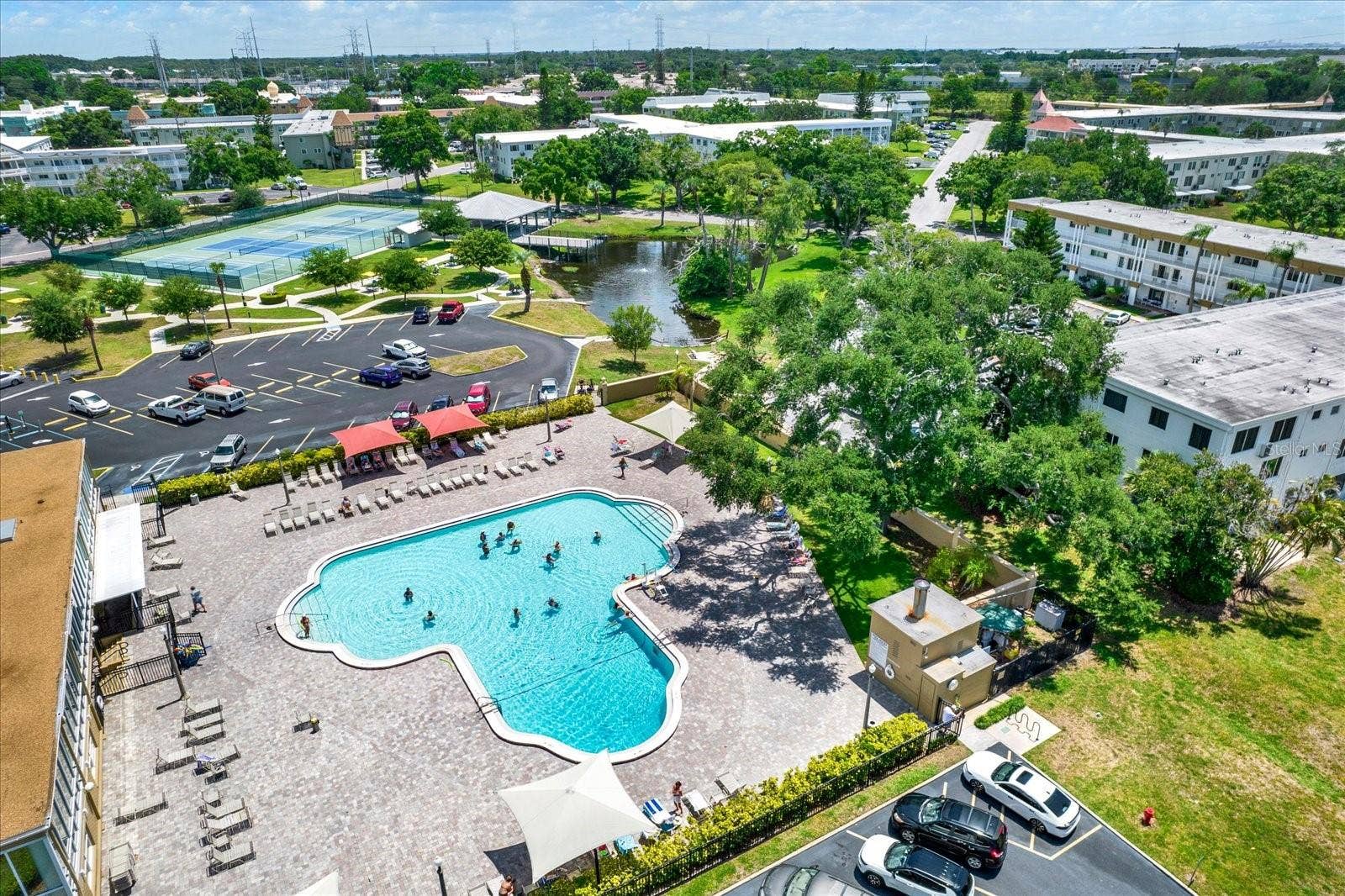 Aerial-View-Community-Pool-Tennis-Pond-On-Top-of-the-World-Clearwater-F