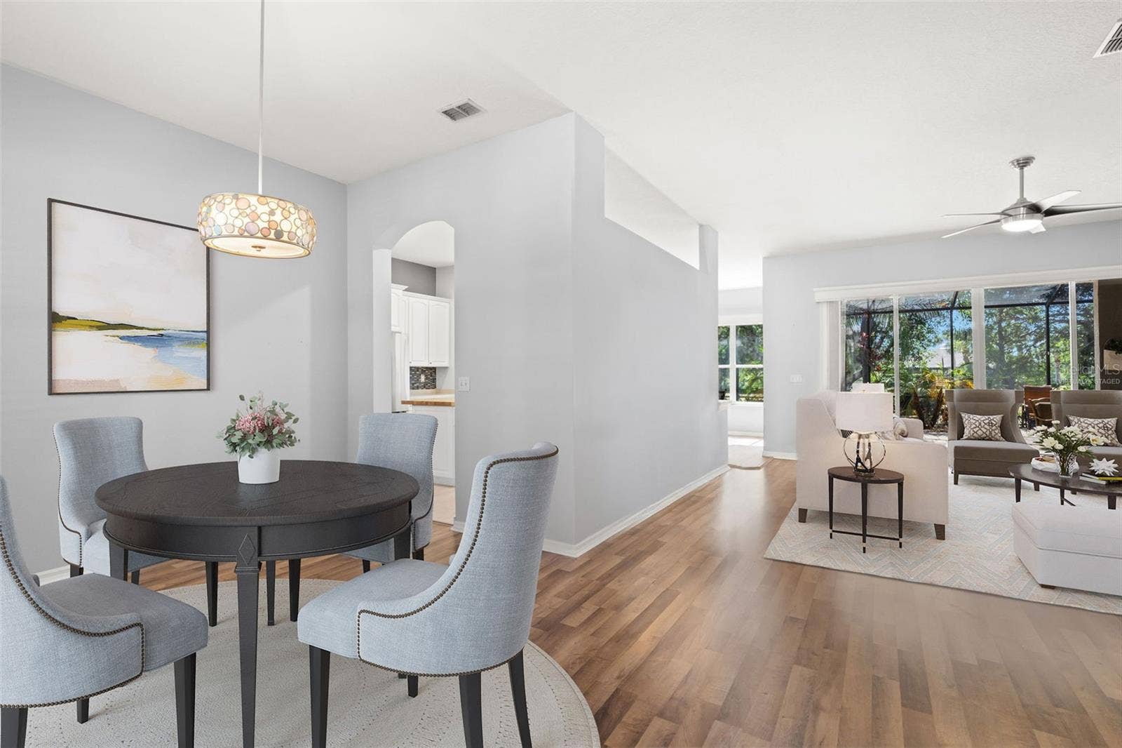Virtually Staged - Dining Room and Living Room with Kitchen Access