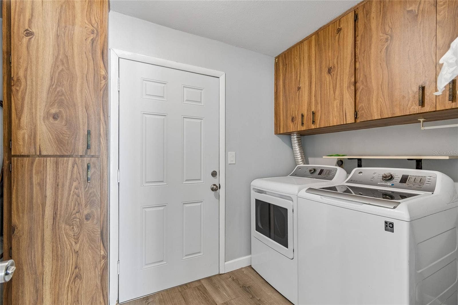 7324 STONE HAVEN COURT N, Pinellas Park, FL 33781 Laundry Room with Exterior Access & Storage