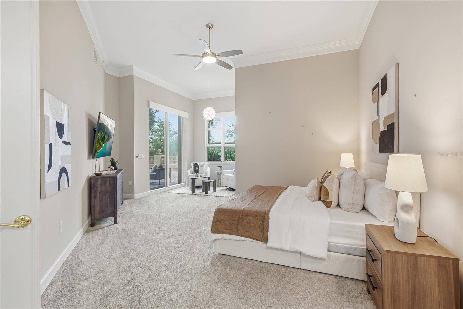Spacious primary suite with sitting area.