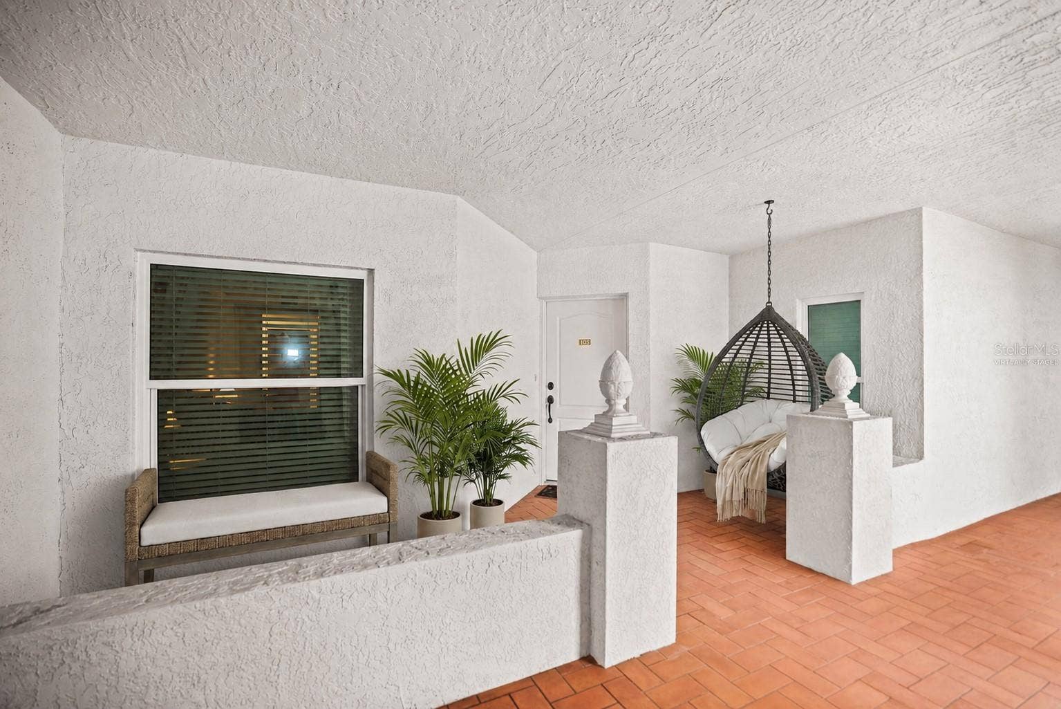 200 121ST AVENUE, #103, Treasure Island, FL 33706 Virtually Staged Courtyard