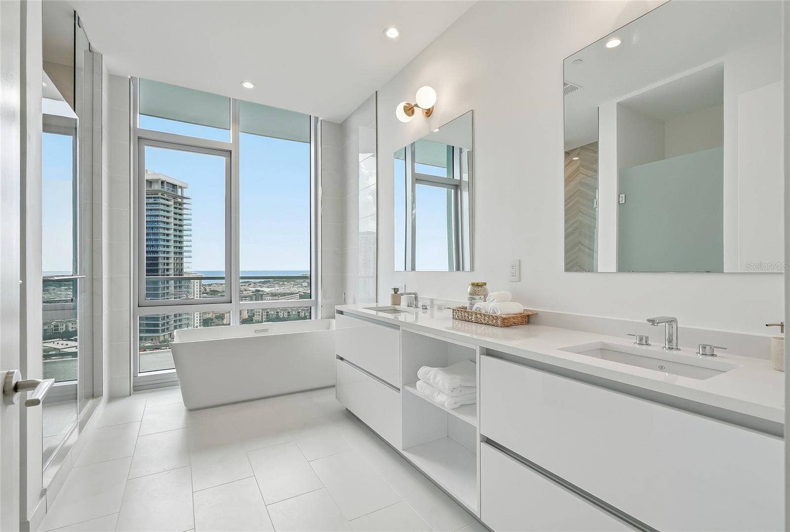 400 CENTRAL AVENUE, #1901, St Petersburg, FL 33701 Freestanding soaking tub and shower create a luxurious escape.