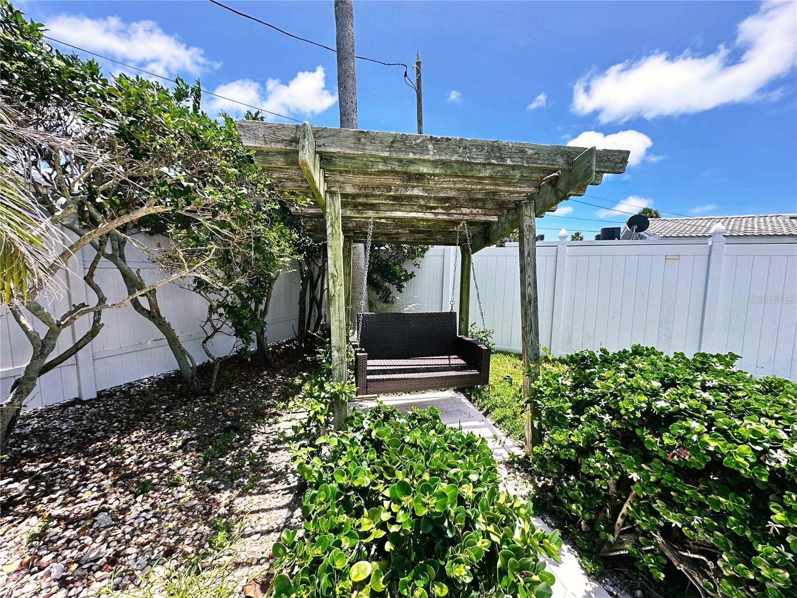 155 112TH AVENUE, #A, Treasure Island, FL 33706 Swing set in the backyard