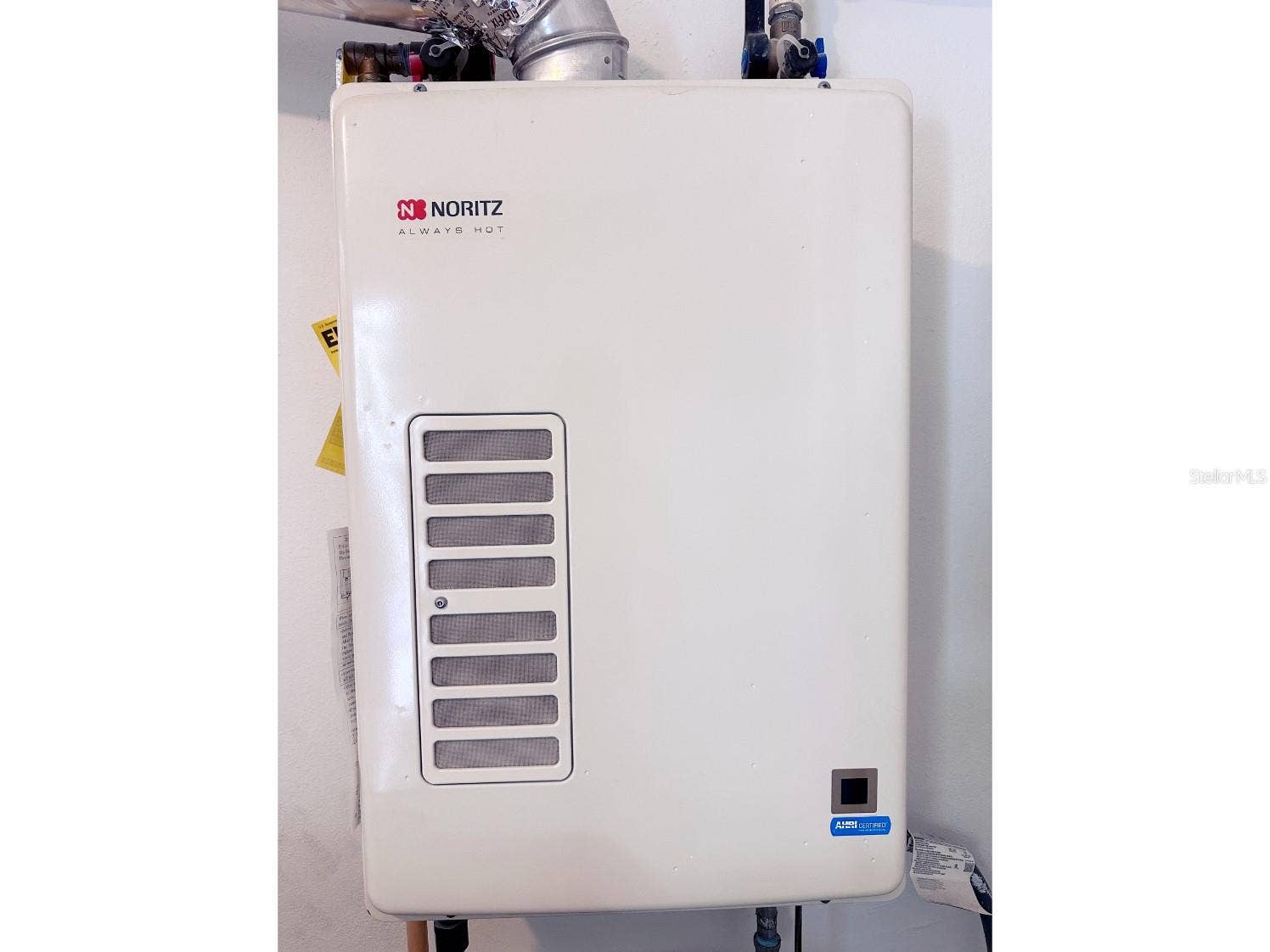 155 112TH AVENUE, #A, Treasure Island, FL 33706 Tankless Hot Water Heater in laundry Room