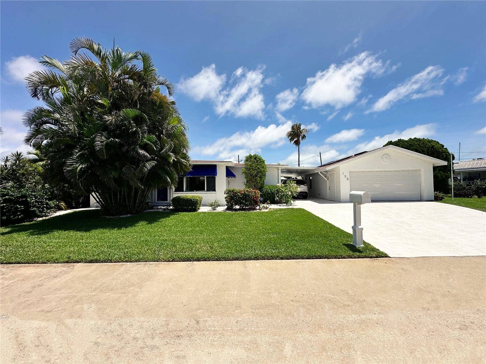 155 112TH AVENUE, #A, Treasure Island, FL 33706 Two stall garage and a carport