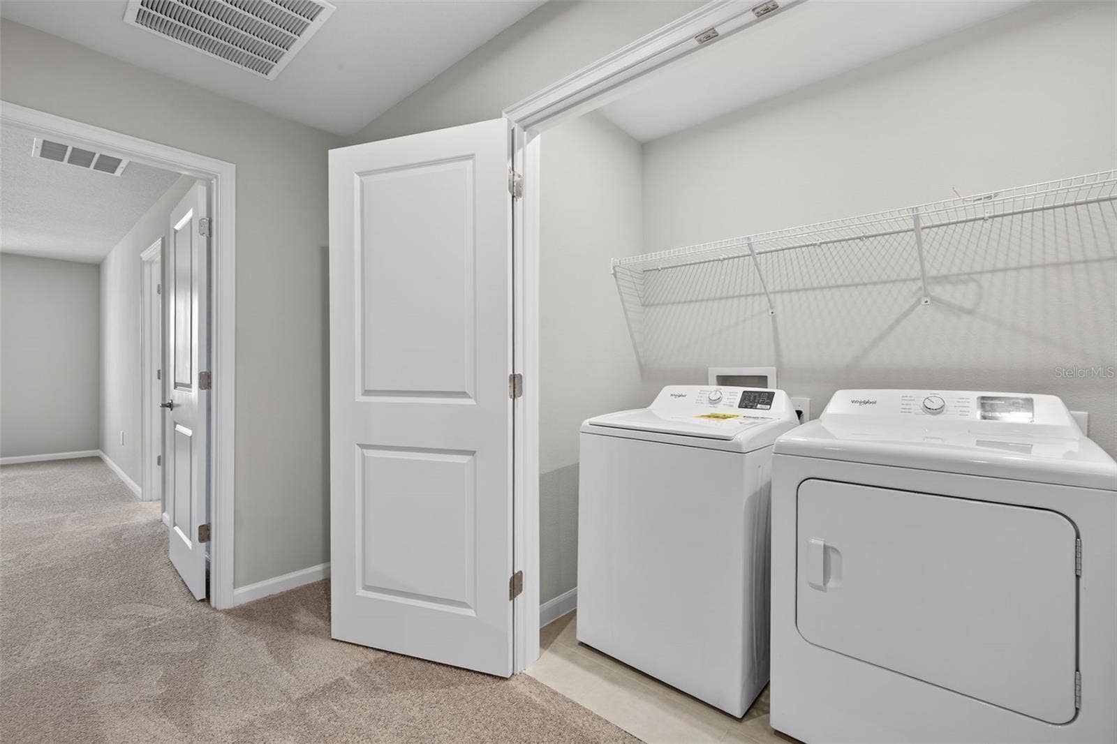 9187 AURELIA AVENUE, Parrish, FL 34219 Laundry