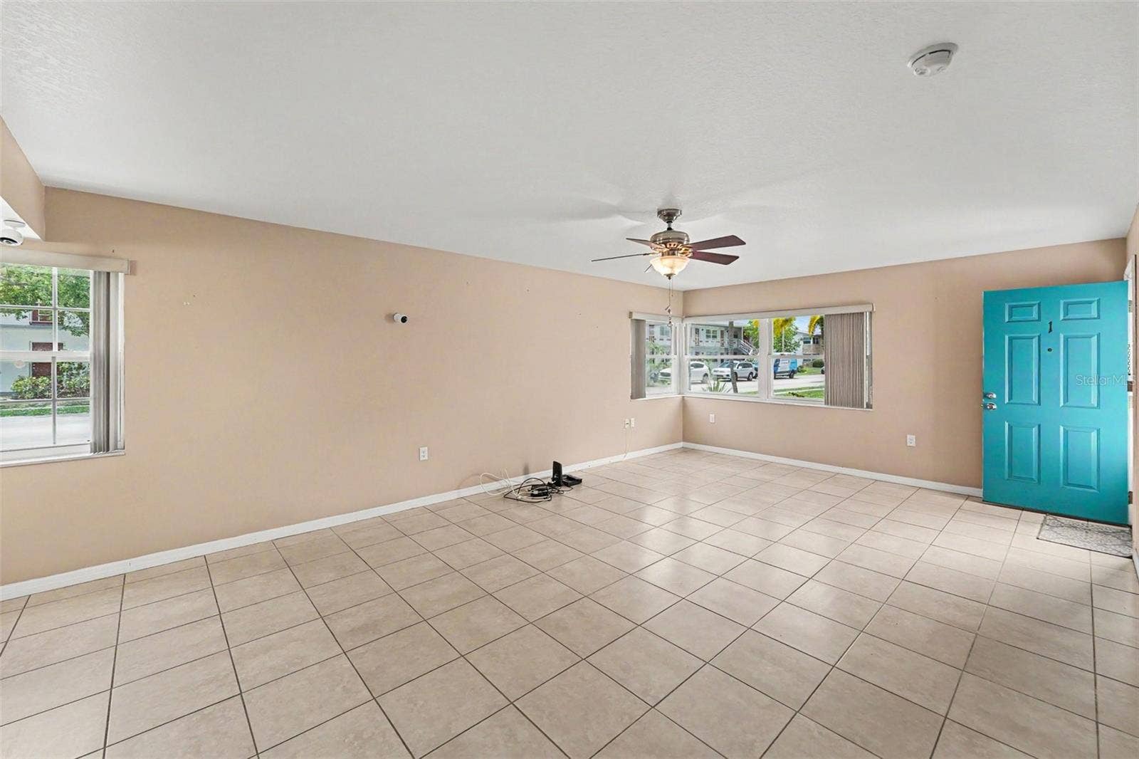 5855 18TH STREET N, #1, St Petersburg, FL 33714 Living Area View From Back Left Corner
