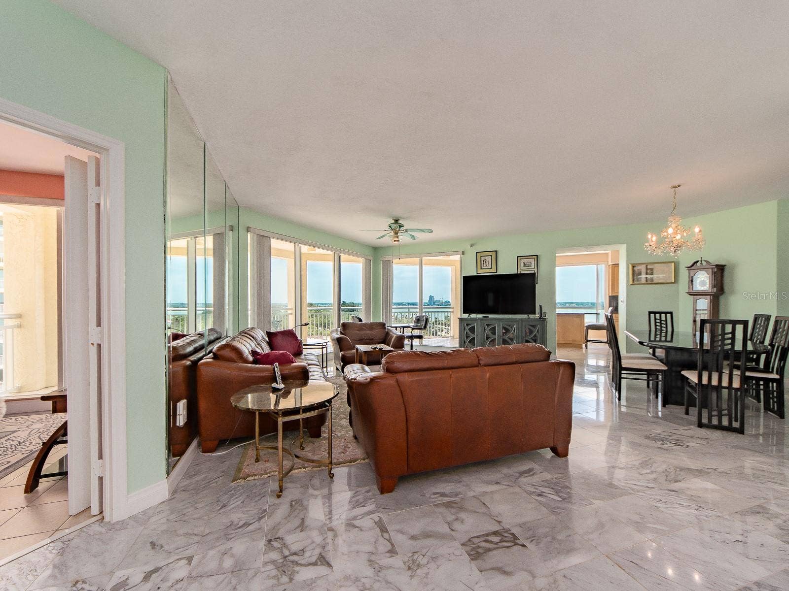 1180 GULF BOULEVARD, #906, Clearwater Beach, FL 33767 Large spacious living area with vies of the gulf and Intracoastal