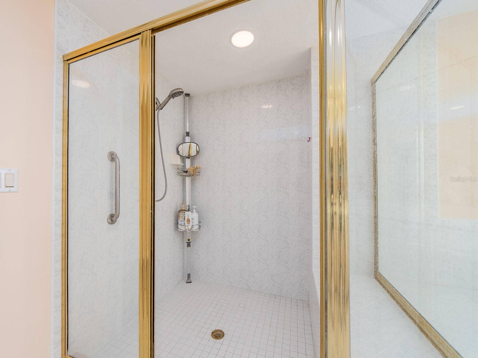 1180 GULF BOULEVARD, #906, Clearwater Beach, FL 33767 Oversized stand up shower.