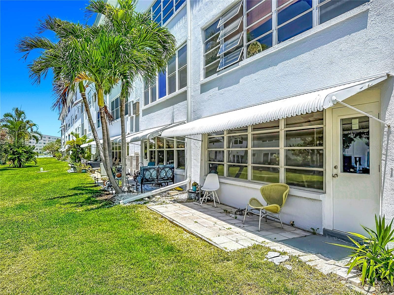 3018 59TH STREET S, #102, Gulfport, FL 33707 Back patio with awning