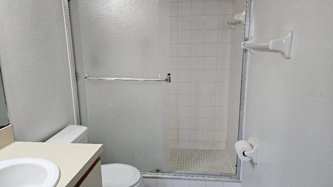 5920 80TH STREET N, #308, St Petersburg, FL 33709 MAIN BATH WITH WALK IN SHOWER