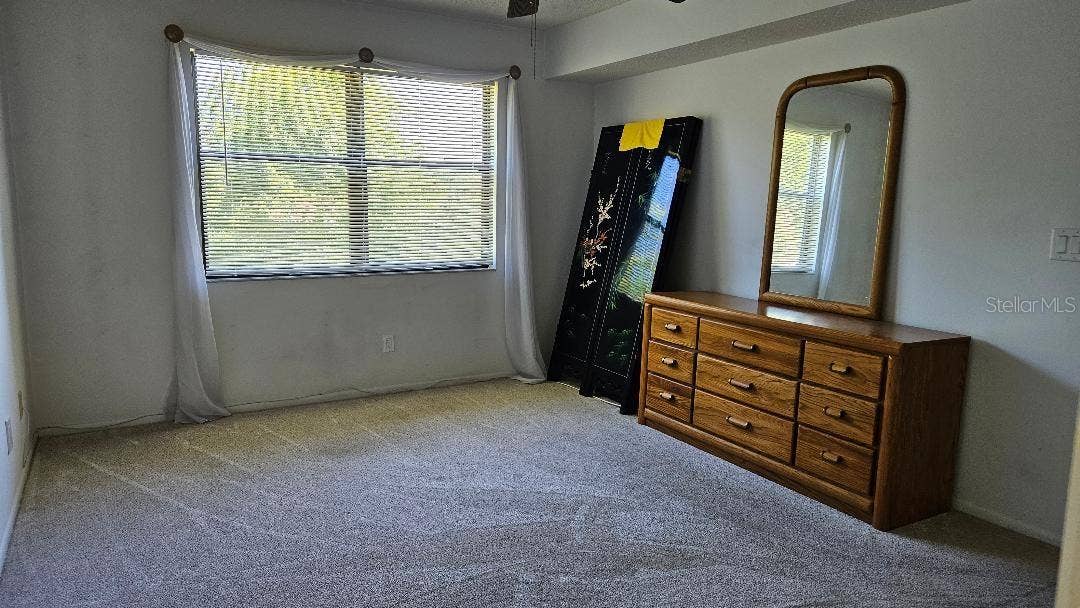 5920 80TH STREET N, #308, St Petersburg, FL 33709 MAIN BEDROOM WITH BATHROOM AND WALK IN CLOSET