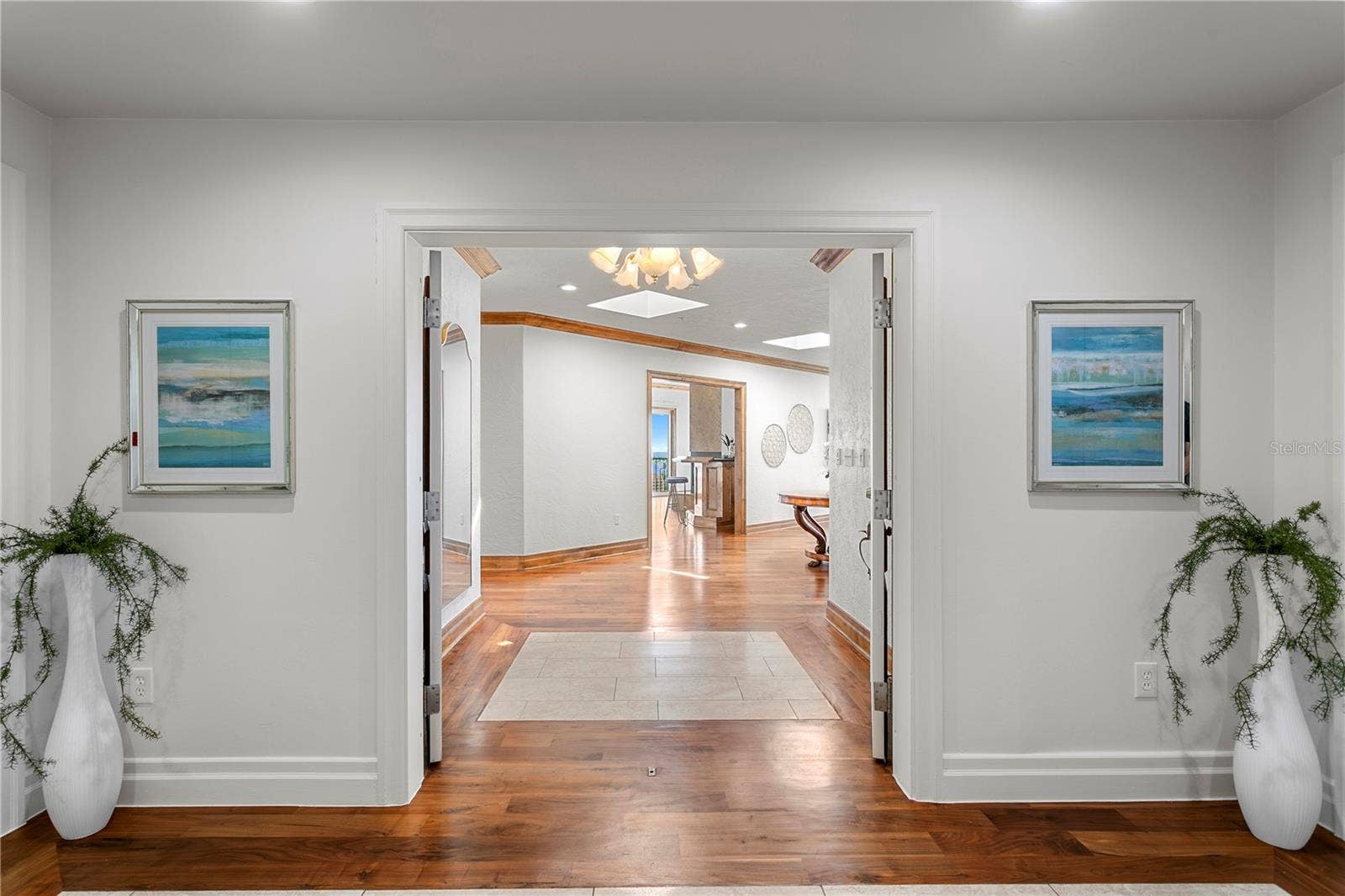 Private elevator foyer  double doors into unit