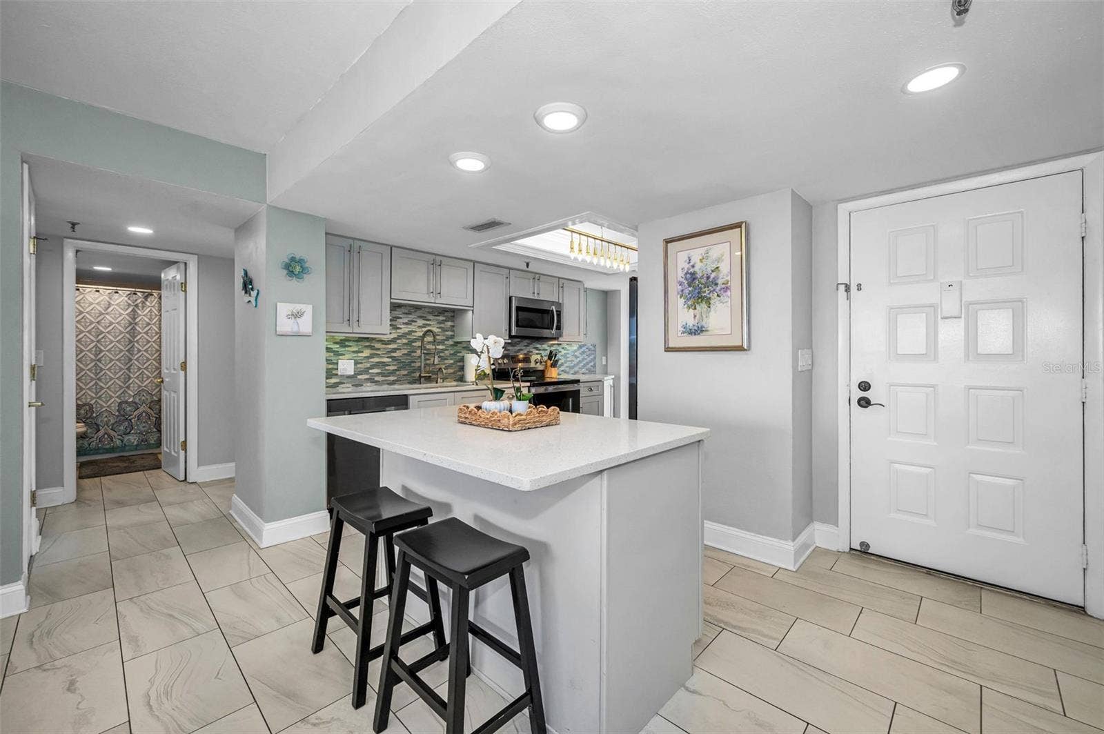 19111 VISTA BAY DRIVE, #304, Indian Shores, FL 33785 Contemporary Kitchen with Center Island and Buffet