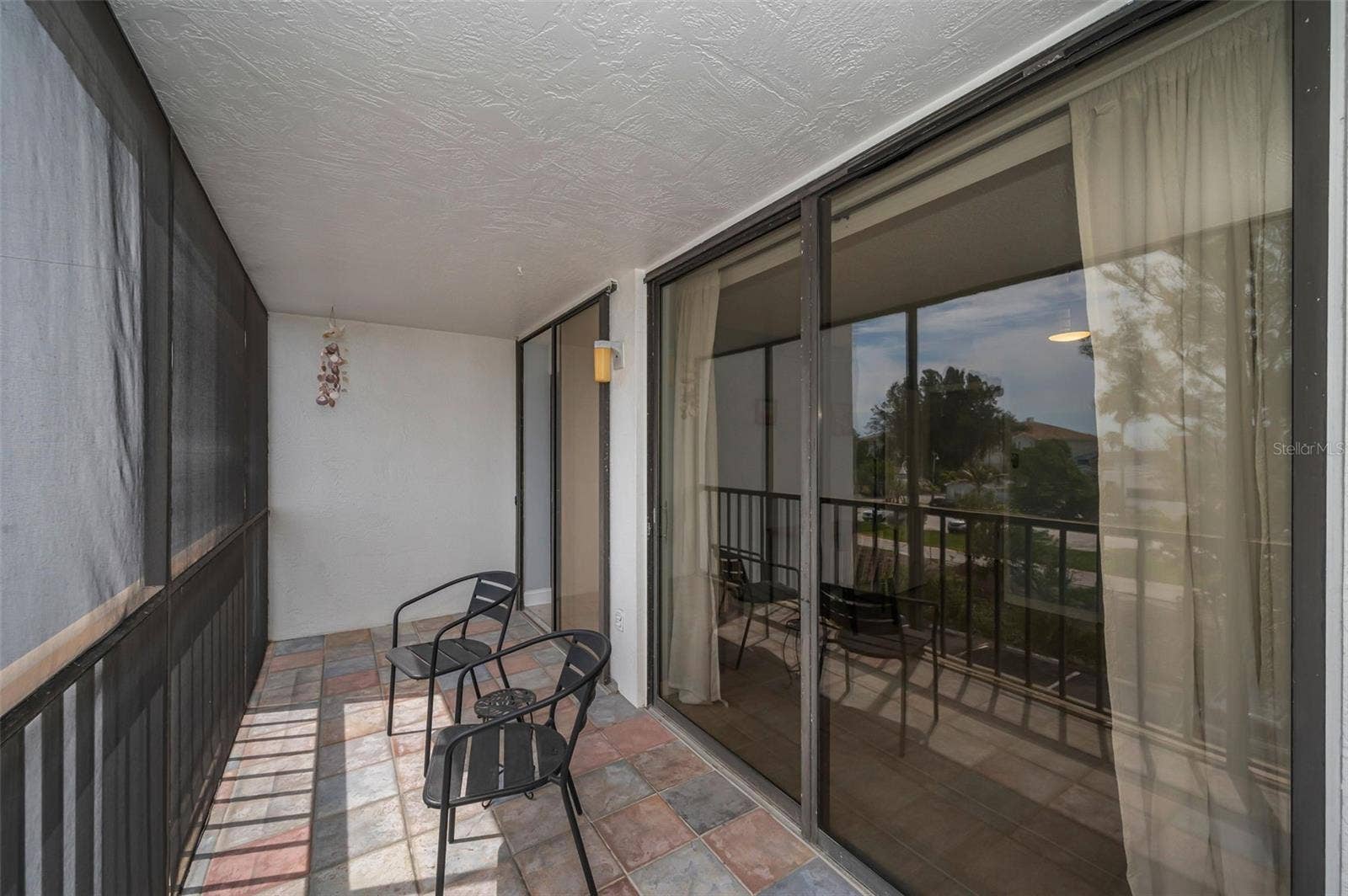 19111 VISTA BAY DRIVE, #304, Indian Shores, FL 33785 West facing balcony off the Kitchen