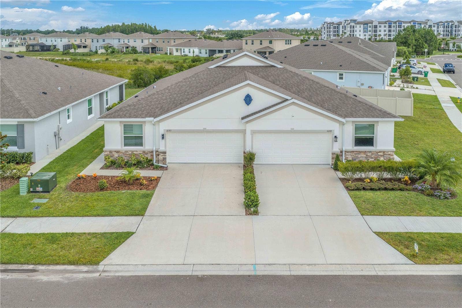 32313 LEXINGTON STREET, Wesley Chapel, FL 33543 beautifully maintained 3-bedroom, 2-bath villa in the highly desirable Woodcreek community of Wesley Chapel