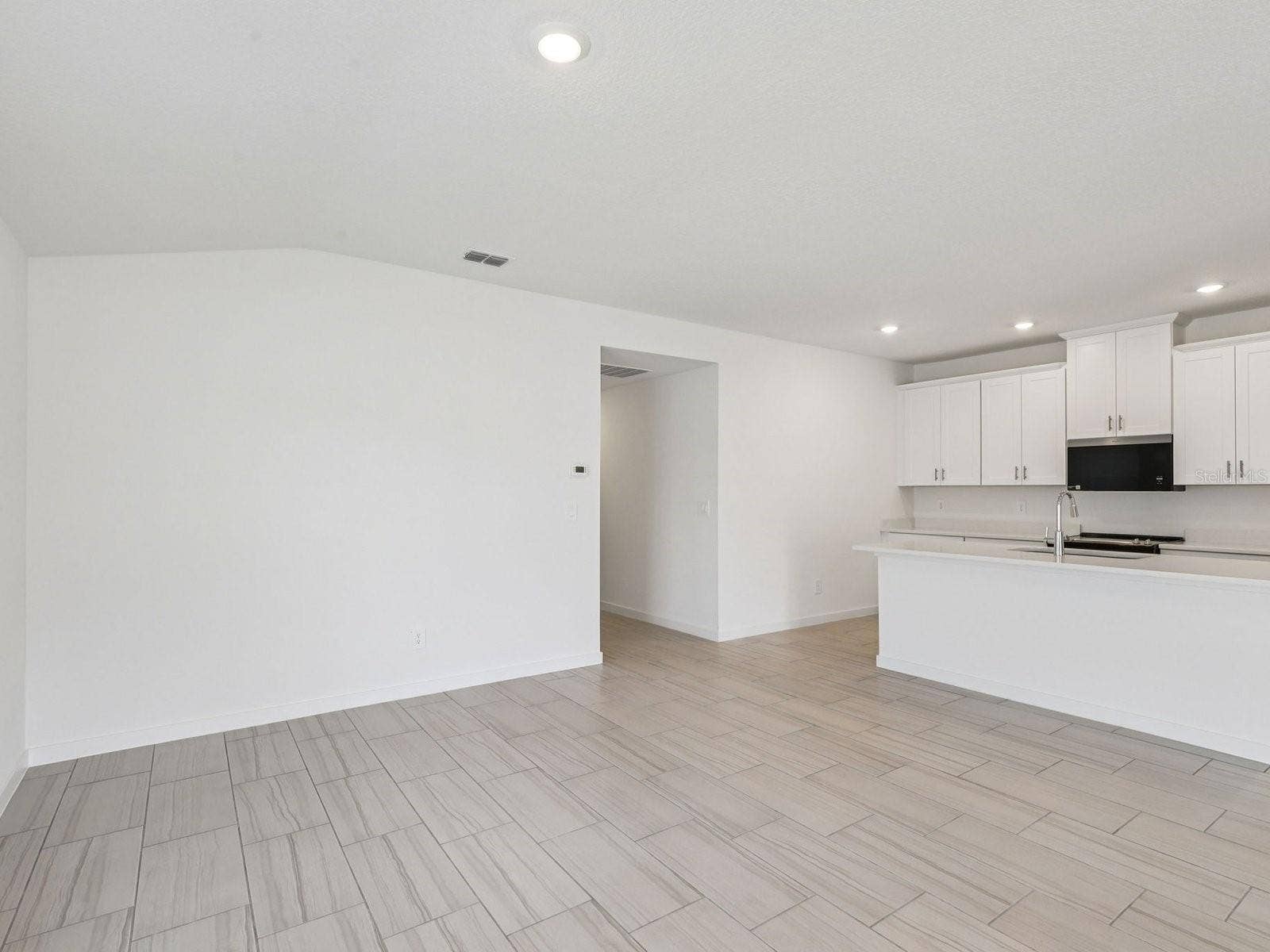 34 GARNI DRIVE, Palm Coast, FL 32137 Photo is not of the actual home, but is an inspirational photo of builders model home and may depict options, furnishings, and/or decorator features that are not included