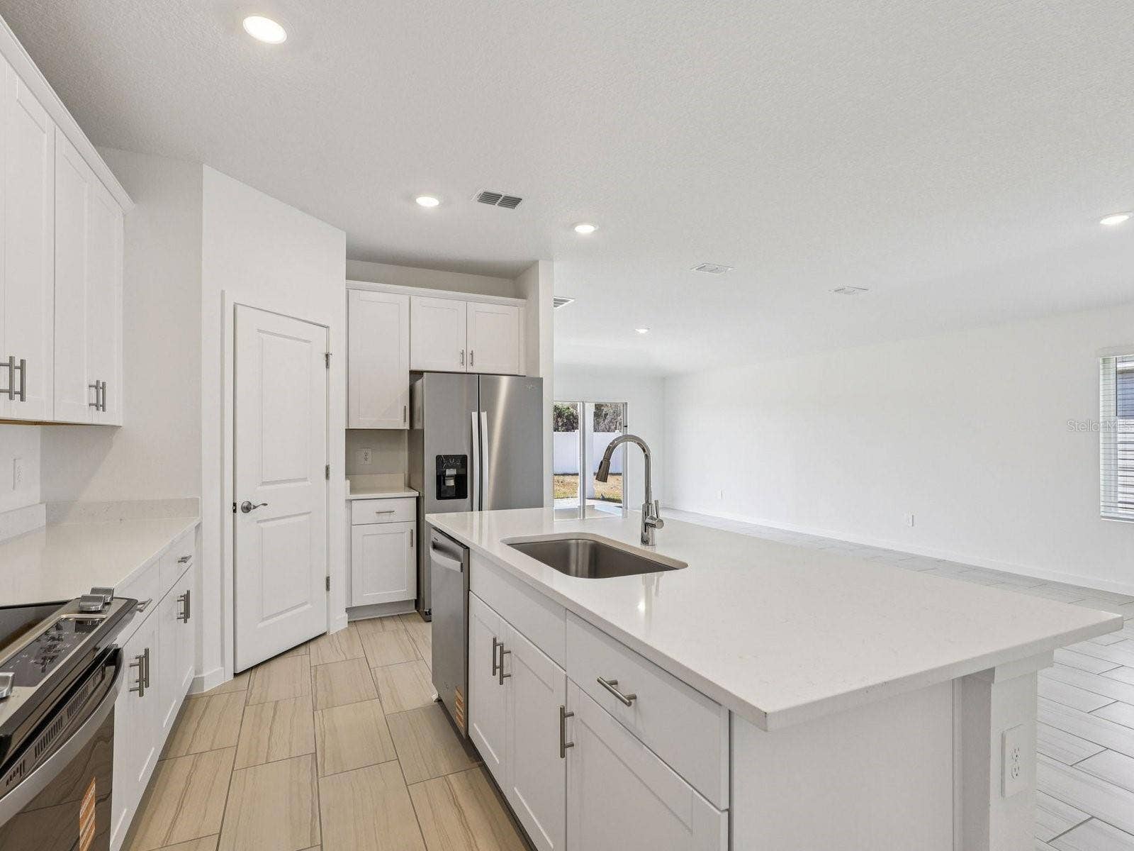 34 GARNI DRIVE, Palm Coast, FL 32137 Photo is not of the actual home, but is an inspirational photo of builders model home and may depict options, furnishings, and/or decorator features that are not included