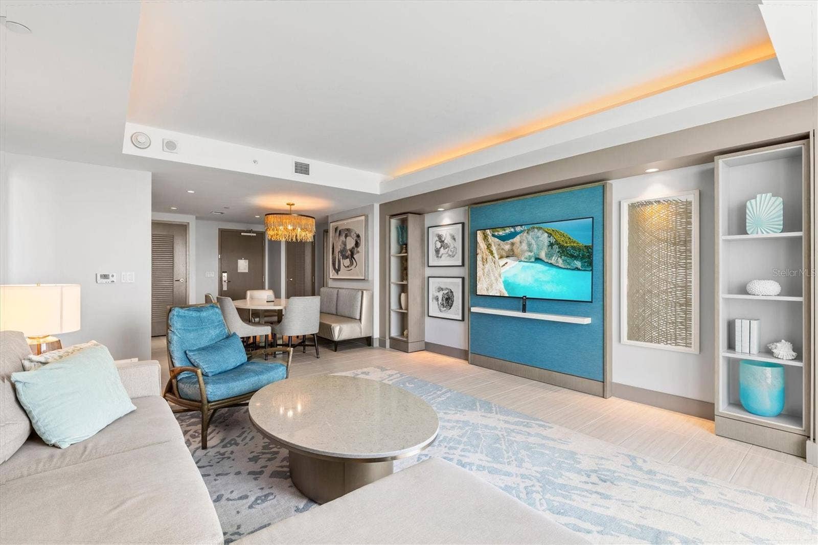691 S GULFVIEW BOULEVARD, #815, Clearwater Beach, FL 33767 Living area with gorgeous views + pull-out sofa